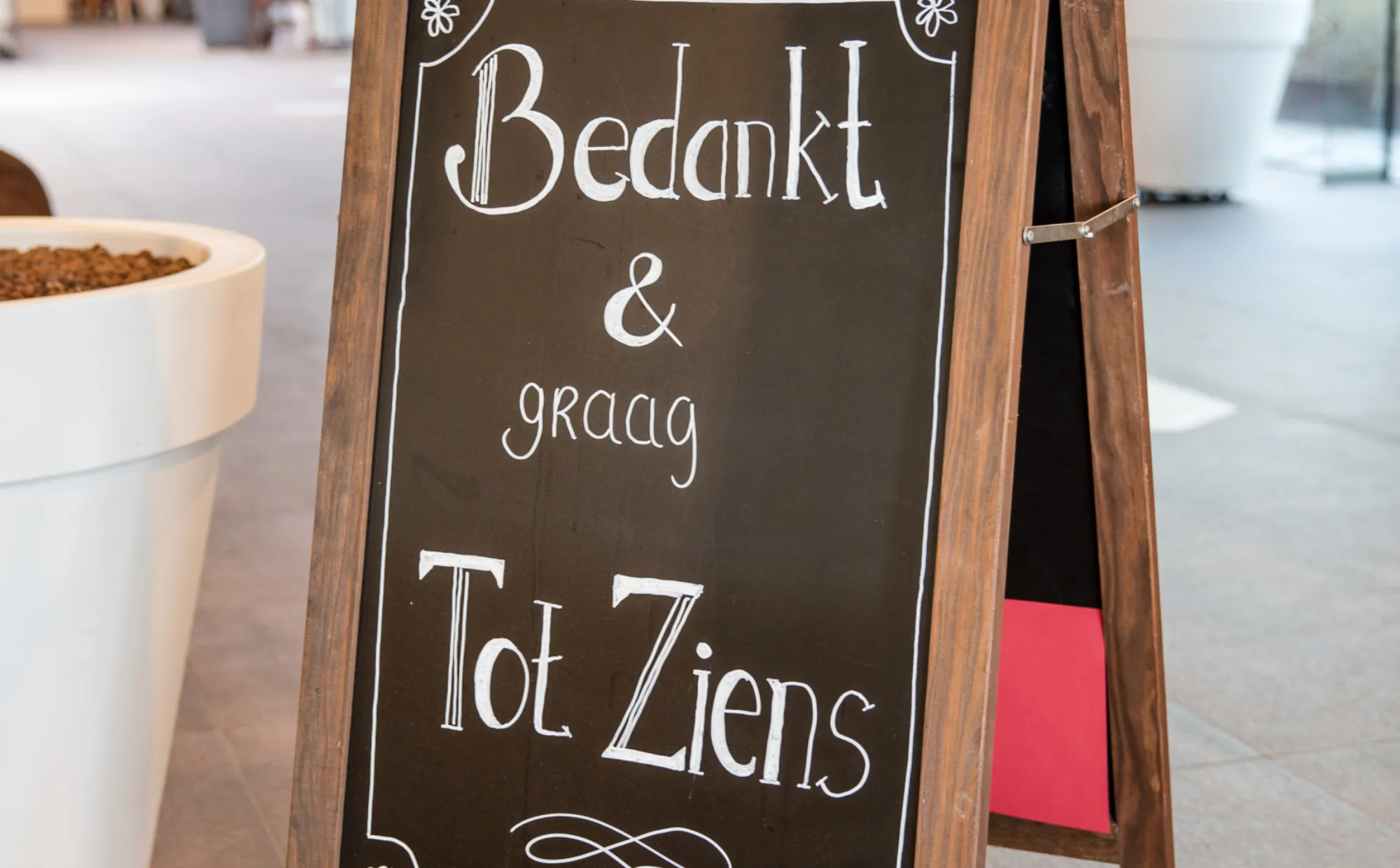 Begroetingsbord bij brasserie
